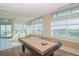 The game room features a pool table with lots of light at 912 Channelside Dr # 2710, Tampa, FL 33602
