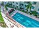 Stunning top-down view of community pool and stylish lounge area, ideal for summer enjoyment at 912 Channelside Dr # 2710, Tampa, FL 33602