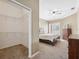 Spacious walk-in closet with carpeted floors and wire shelving for optimal storage organization at 9127 Irondale Ln, Hudson, FL 34667