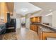 Kitchen with granite countertops, mosaic backsplash, wood cabinets and stainless steel appliances at 9127 Irondale Ln, Hudson, FL 34667