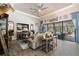 Open floor plan with living room views to the pool area and tile flooring at 922 Grand Cresta Ave, Brandon, FL 33511