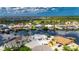 Beautiful aerial view of a waterfront community featuring houses with private docks and stunning water views at 927 Golf Island Dr, Apollo Beach, FL 33572