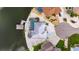 Aerial view showcasing waterfront home with pool, dock, meticulous landscaping, and neighborhood with stunning water access at 927 Golf Island Dr, Apollo Beach, FL 33572