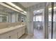 Bathroom featuring a vanity with mirror, tile floor, and adjacent toilet and mirrored closet at 927 Golf Island Dr, Apollo Beach, FL 33572