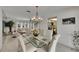 Open concept dining area connected to living room and kitchen, perfect for modern living at 927 Golf Island Dr, Apollo Beach, FL 33572