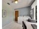 Functional laundry room with a washer, dryer, and a desk area for added convenience at 927 Golf Island Dr, Apollo Beach, FL 33572