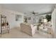 Inviting living room with neutral tones and a seamless connection to the dining area, perfect for entertaining at 927 Golf Island Dr, Apollo Beach, FL 33572