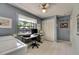 Comfortable office space with waterfront views, a functional workspace, and ample storage, perfect for working from home at 927 Golf Island Dr, Apollo Beach, FL 33572