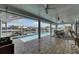 Spacious screened patio with a pristine pool and outdoor dining area, perfect for entertaining and enjoying waterfront living at 927 Golf Island Dr, Apollo Beach, FL 33572