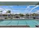 Relaxing pool area with covered lanai and waterfront views in a beautiful setting at 927 Golf Island Dr, Apollo Beach, FL 33572