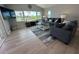 Bright living room with comfortable seating, large windows and view of a waterway at 1137 Treasure Cay Ct, Punta Gorda, FL 33950