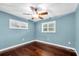 Comfortable bedroom boasting hardwood floors, bright windows, and plenty of natural light at 1180 39Th N St, St Petersburg, FL 33713