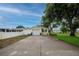 Charming single-story home with a well-maintained front yard and an attached garage at 1180 39Th N St, St Petersburg, FL 33713
