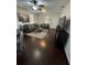 Inviting living room with dark wood floors, comfortable sofas, and lots of natural light at 1211 E Curtis St, Tampa, FL 33603