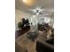Open-concept living area leading to the dining room, with comfortable seating and modern decor at 1211 E Curtis St, Tampa, FL 33603