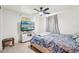Cozy bedroom with fan and window view at 12701 Cornell Ct, Hudson, FL 34667