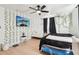 Nicely decorated bedroom with vines on the walls and black out curtains at 12701 Cornell Ct, Hudson, FL 34667