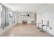 Sunlit living area featuring stylish decor, wood floors, and a cozy ambiance at 12701 Cornell Ct, Hudson, FL 34667