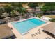 Aerial view of the community pool featuring ample seating and convenient access to local amenities at 12815 Tallowood Dr, Riverview, FL 33579