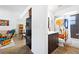Bright bathroom features a dark wood vanity and colorful floral shower curtain at 13024 124Th Ave, Largo, FL 33774