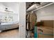 Walk-in closet with built-in shelves and ample storage space adjacent to the bedroom at 13024 124Th Ave, Largo, FL 33774