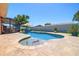 Enjoy the sparkling pool surrounded by a brick paver patio, perfect for outdoor relaxation and entertaining guests at 13024 124Th Ave, Largo, FL 33774