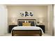 Serene bedroom features stylish furnishings, plush bedding, and soft lighting for a relaxing ambiance at 13186 Goldstone Ct, Wimauma, FL 33598