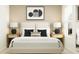 A cozy bedroom featuring a plush bed, bedside tables, and lamps for a comfortable retreat at 13186 Goldstone Ct, Wimauma, FL 33598