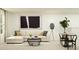 Inviting living room showcasing stylish seating, contemporary art, and elegant décor accents at 13186 Goldstone Ct, Wimauma, FL 33598