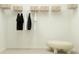 Spacious walk-in closet with shelving, hanging racks, and ample storage space at 13186 Goldstone Ct, Wimauma, FL 33598