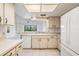 Spacious kitchen with modern appliances and access to the living area at 13610 S Village Dr # 4212, Tampa, FL 33618