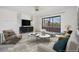 Comfortable living room with large sliding glass doors leading to a balcony at 13610 S Village Dr # 4212, Tampa, FL 33618