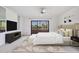 Bright main bedroom with large sliding glass doors leading to a balcony at 13610 S Village Dr # 4212, Tampa, FL 33618