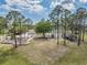 View of community playground with slides, swings, picnic shelter, and walking path at 13610 S Village Dr # 4212, Tampa, FL 33618