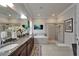 Spacious bathroom with double sinks, garden tub, and separate shower at 13622 Tonya Anne Dr, Riverview, FL 33579
