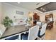 Charming dining area featuring a decorative hutch and seating for six with a view of the kitchen at 13622 Tonya Anne Dr, Riverview, FL 33579
