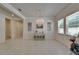 Bright dining room with chandelier, neutral decor, lots of light and plenty of space for entertaining at 13622 Tonya Anne Dr, Riverview, FL 33579