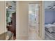 This interior hallway connects an office, a full bathroom, and a bedroom at 13622 Tonya Anne Dr, Riverview, FL 33579