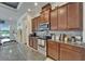 Well-equipped kitchen with stainless steel appliances and granite countertops at 13622 Tonya Anne Dr, Riverview, FL 33579
