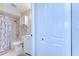 Bathroom with a combination tub and shower featuring white tile and fixtures at 13870 Oakwood Ln # 13870, Seminole, FL 33776