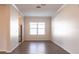 Dining area with modern wood-look floors, a large window, and stainless steel appliances nearby at 1430 Blue Horizon Cir, Bradenton, FL 34208
