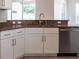 Kitchen cabinet with granite countertops and stainless steel dishwasher at 1430 Blue Horizon Cir, Bradenton, FL 34208