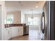 Bright kitchen featuring stainless steel appliances and granite countertops at 1430 Blue Horizon Cir, Bradenton, FL 34208