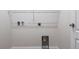 Interior view of a dedicated laundry room featuring washer and dryer hookups at 1430 Blue Horizon Cir, Bradenton, FL 34208