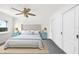 Calming main bedroom with a ceiling fan and an abundance of closet space at 1451 Gulf Blvd # 117, Clearwater Beach, FL 33767