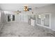 Bonus room features a wet bar, ample lighting, and access to outdoor patio at 14721 Scharber Rd, Dade City, FL 33525