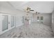 Bonus room includes a wet bar, mini fridge, and access to the outdoor pool area at 14721 Scharber Rd, Dade City, FL 33525