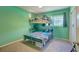 Bright bedroom featuring a bunk bed and a lively color scheme at 1644 Scott St, Clearwater, FL 33755