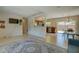 Open-concept living space seamlessly connects the living room, kitchen, and dining area at 1644 Scott St, Clearwater, FL 33755