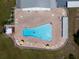 Overhead view of community pool with lounge chairs surrounding it at 1950 59Th N Ave # 208, St Petersburg, FL 33714